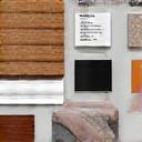 Samples of wood, stone, and laminate materials.